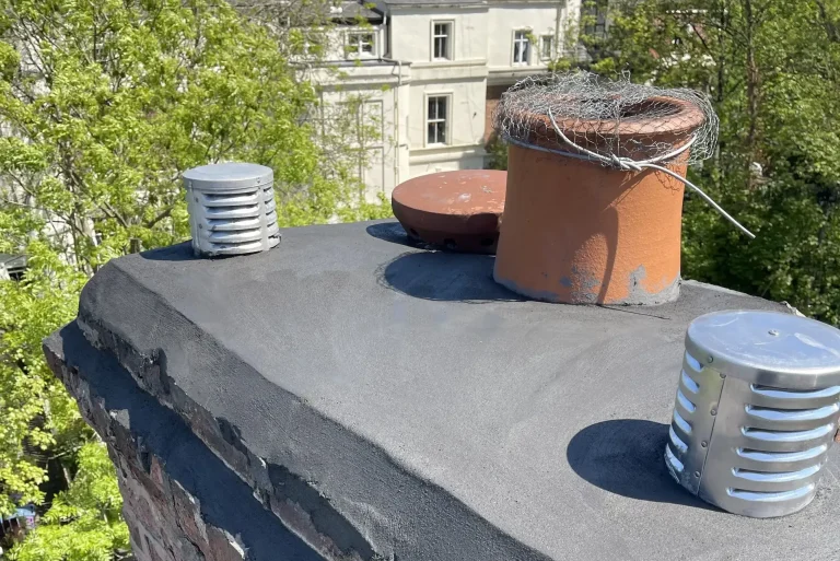 Chimney stack with new flaunching, chimney pots and cowls