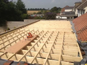 Timber joists and firrings for a new flat roof